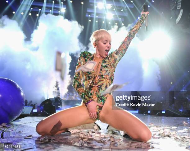 Miley Cyrus performs onstage during her "Bangerz" tour at Rogers Arena on February 14, 2014 in Vancouver, Canada.