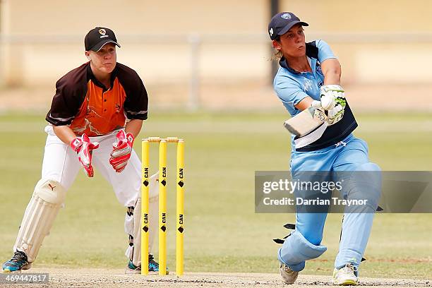 Roxanne Van-Veen of New South Wales plays a shot during the Imparja Cup final between New South Wales and the Northern Territory at Traeger Park on...