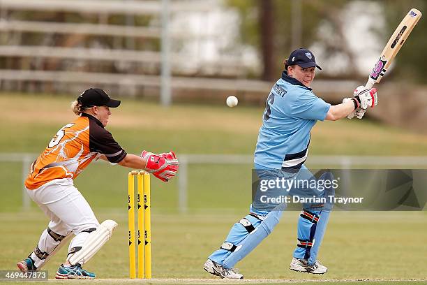 Nicole Honeysett of New South Wales plays a shot during the Imparja Cup final between New South Wales and the Northern Territory at Traeger Park on...