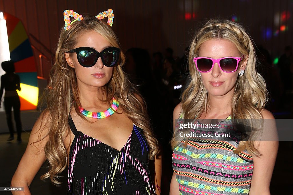 Paris Hilton and Nicky Hilton attend the Neon Carnival with PacSun