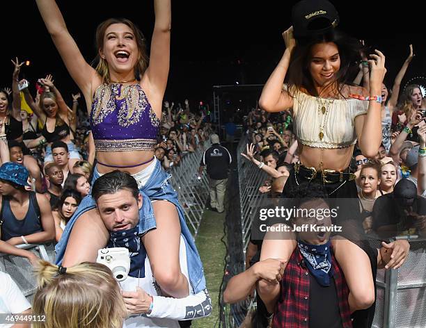 Model Kendall Jenner and Alfredo Flores , Hailey Baldwin in the audience during day 2 of the 2015 Coachella Valley Music & Arts Festival at the...