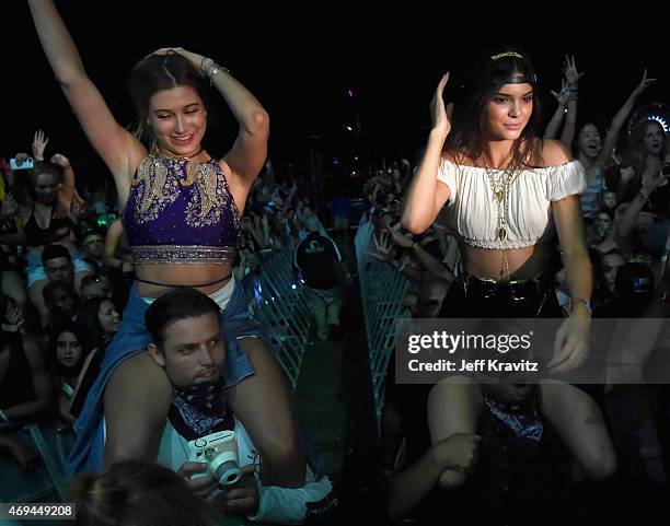 Model Kendall Jenner and Alfredo Flores , Hailey Baldwin and guests in the audienceduring day 2 of the 2015 Coachella Valley Music & Arts Festival at...