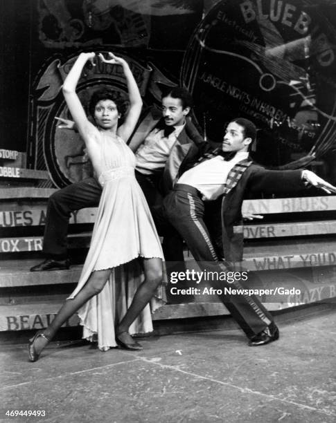 Full length portrait of actors, from left to right, Vivian Reed, Newton Winters and Lonnie McNeil on stage performing in the Broadway Musical...
