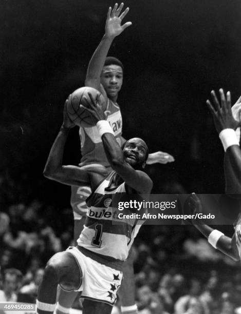 Gus Williams, basketball player for Baltimore Bullets, made 24 points against the Atlanta Hawks during a basketball game, 1980.