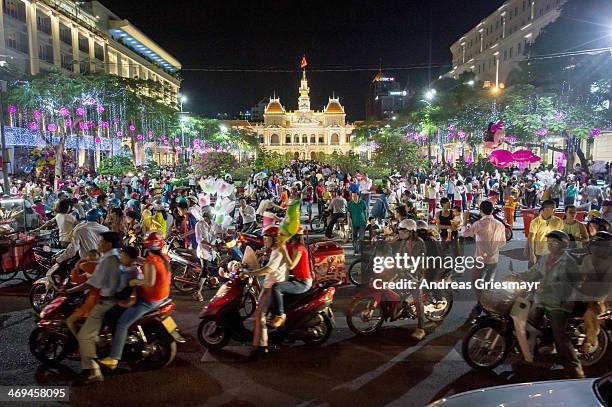 People gathering in the dressed up city center of Ho Chi Minh City celebrating Tet, the Vietnamese New Year