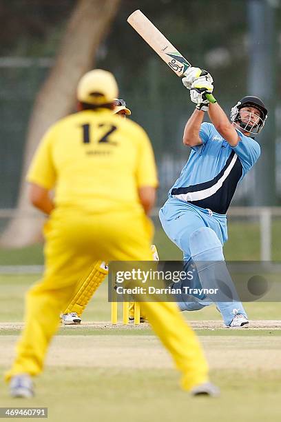 Jeff Cook of New South Wales plays a shot during the Imparja Cup Final between New South Wales and Western Australia at Traeger Park on February 15,...