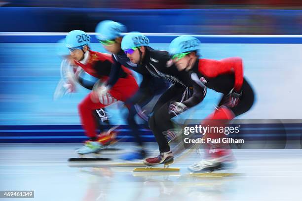 Tianyu Han of China, Han-Bin Lee of Korea, Chris Creveling of the United States and Charle Cournoyer of Canada during the Men's 1000m Quarterfinal...