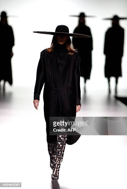 Model presents Autumn/Winter 2014-2015 collection creations by Martin Lamothe during Madrid Fashion Week in Madrid on February 15, 2014. AFP PHOTO /...