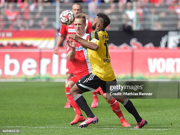 Bjoern Jopek of 1 FC Union Berlin and Phil Ofosu-Ayeh of VfR Aalen during the game between Union Berlin and VfR Aalen on april 12, 2015 in Berlin,...