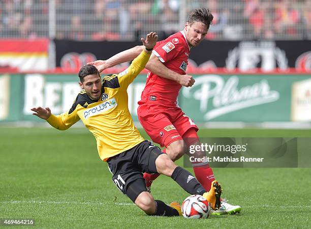 Fabio Kaufmann of VfR Aalen and Michael Parensen of 1 FC Union Berlin during the game between Union Berlin and VfR Aalen on april 12, 2015 in Berlin,...