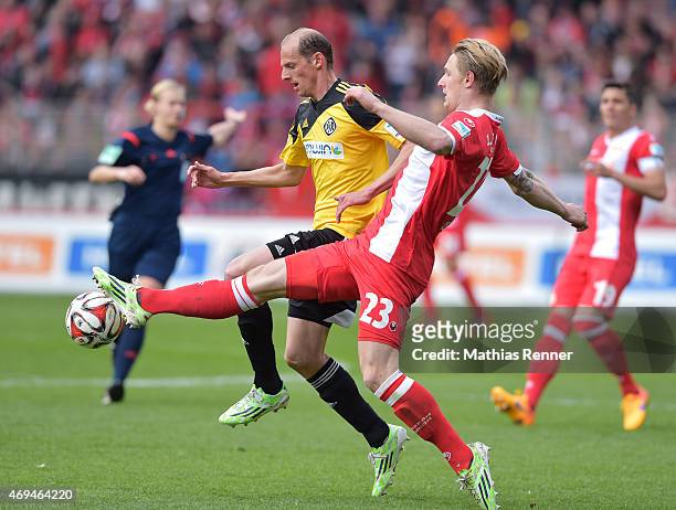 Oliver Barth of VfR Aalen and Sebastian Polter of 1 FC Union Berlin during the game between Union Berlin and VfR Aalen on april 12, 2015 in Berlin,...