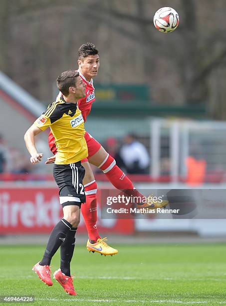 Andreas Hofmann of VfR Aalen and Damir Kreilach of 1 FC Union Berlin during the game between Union Berlin and VfR Aalen on april 12, 2015 in Berlin,...