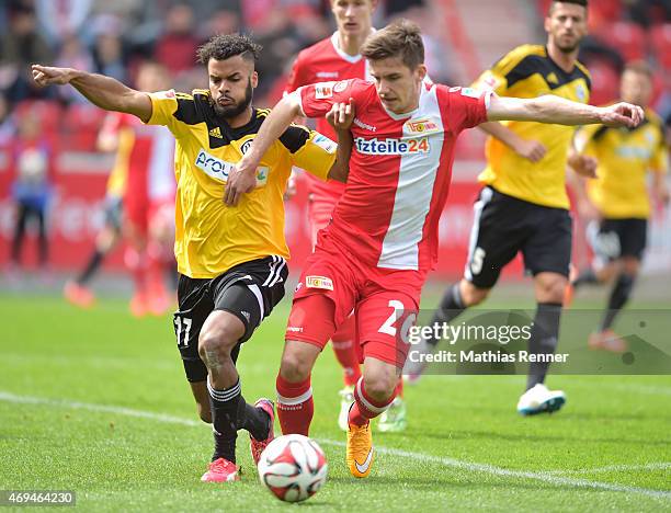 Phil Ofosu-Ayeh of VfR Aalen and Valmir Sulejmani of 1 FC Union Berlin during the game between Union Berlin and VfR Aalen on april 12, 2015 in...