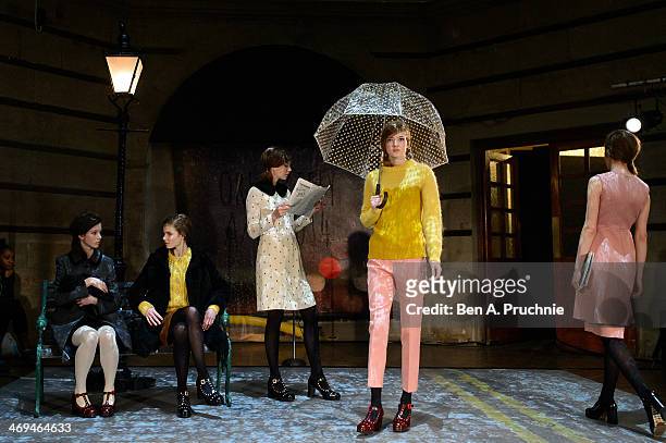 Model walks during the Orla Kiely presentation at London Fashion Week AW14 at Central Saint Martins on February 15, 2014 in London, England.
