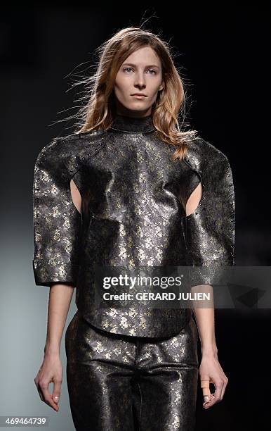 Model presents Autumn/Winter 2014-2015 collection creations by Martin Lamothe during Madrid Fashion Week in Madrid on February 15, 2014. AFP PHOTO /...