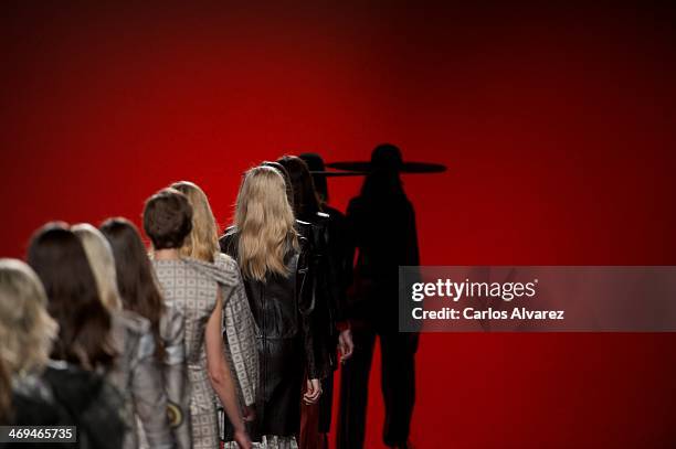 Models showcase designs by Martin Lamothe on the runway at Martin Lamothe show during Mercedes Benz Fashion Week Madrid Fall/Winter 2014 at Ifema on...