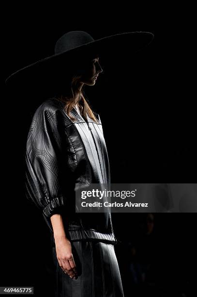 Model showcases designs by Martin Lamothe on the runway at Martin Lamothe show during Mercedes Benz Fashion Week Madrid Fall/Winter 2014 at Ifema on...