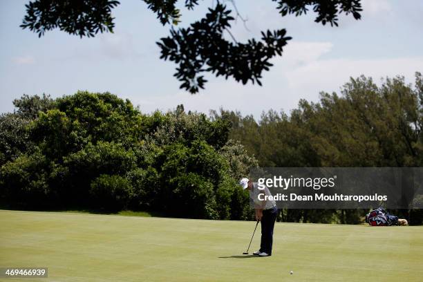 Emiliano Grillo of Argentina putts on the 6th green during Day 3 of the Africa Open at East London Golf Club on February 15, 2014 in East London,...