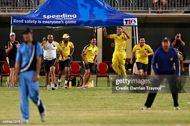 Western Australia players celebrate the winning runs during the Imparja Cup Final between Western Australia and New Soth Wales at Traeger Park on...