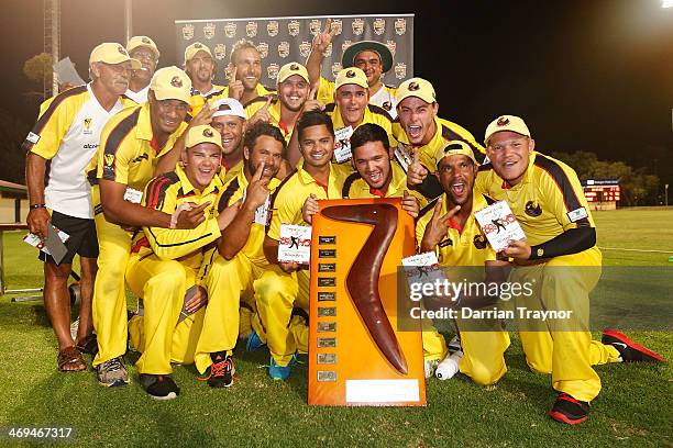 Western Australia celebrate winning during the Imparja Cup against New South Wales at Traeger Park on February 15, 2014 in Alice Springs, Australia.