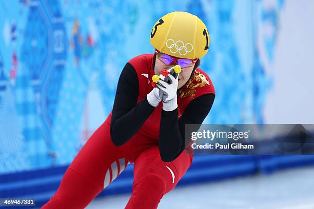 Yang Zhou of China celebrates winning the gold medal during the Ladies' 1500 m Final Short Track Speed Skating on day 8 of the Sochi 2014 Winter...