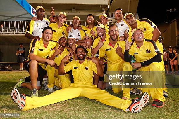 Western Australia celebrate winning during the Imparja Cup against New South Wales at Traeger Park on February 15, 2014 in Alice Springs, Australia.