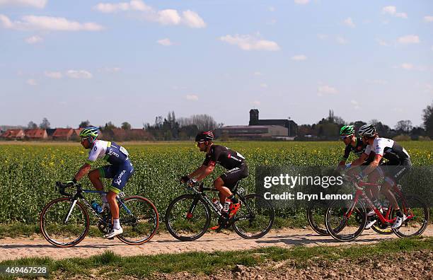 Adam Blythe of Great Britain and Orica Greenedge leads the breakaway group during the 113th edition of the Paris-Roubaix cycle race from Paris to...