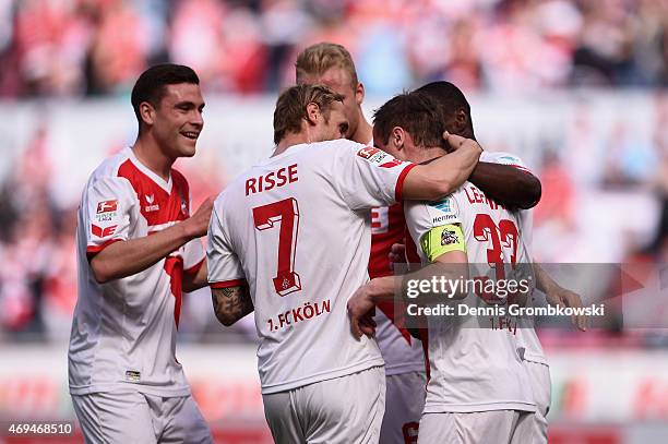 Matthias Lehmann of 1. FC Koeln celebrates as he scores the opening goal from a penalty during the Bundesliga match between 1. FC Koeln and 1899...