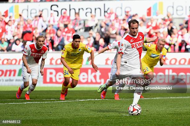 Matthias Lehmann of 1. FC Koeln scores the opening goal from a penalty during the Bundesliga match between 1. FC Koeln and 1899 Hoffenheim at...