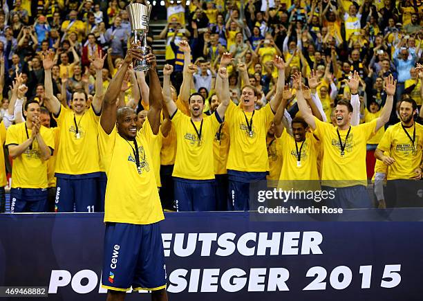 Ricky Paulding of Oldenburg lifts thr trophy after winning the BEKO BBL Top Four final game between EWE Baskets Oldenburg and Brose Baskets Bamberg...