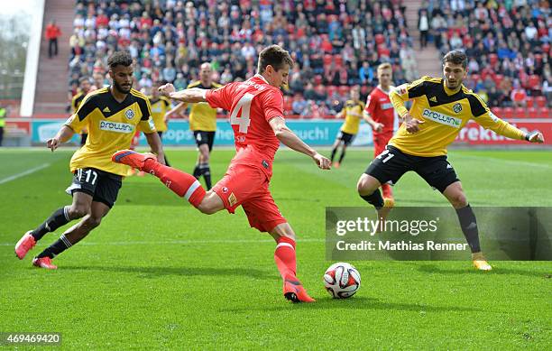 Phil Ofosu-Ayeh, Steven Skrzybski of 1 FC Union Berlin and Fabio Kaufmann of VfR Aalen during the game between Union Berlin and VfR Aalen on april...