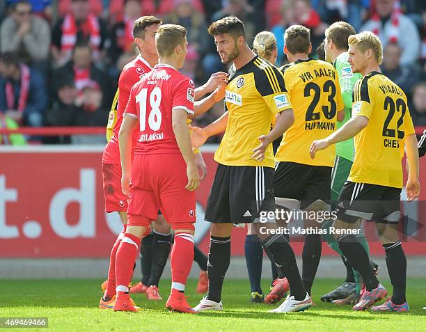 Martin Kobylanski of 1 FC Union Berlin and Jurgen Gjasula of VfR Aalen argue during the game between Union Berlin and VfR Aalen on april 12, 2015 in...