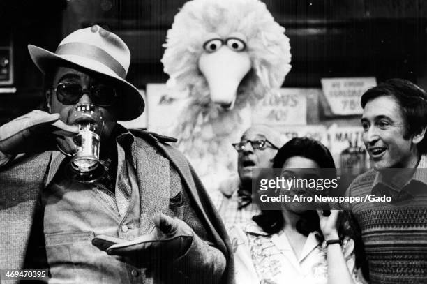 James Earl Jones guest stars on Sesame Street with regular cast members Big Bird, Mr Hooper and Maria to try the perfect egg cream, New York, April...