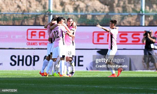 Ivajlo Chocev of US Citta di Palermo is congratulated by team mates after scoring his team's third goal of the game during the Serie A match between...