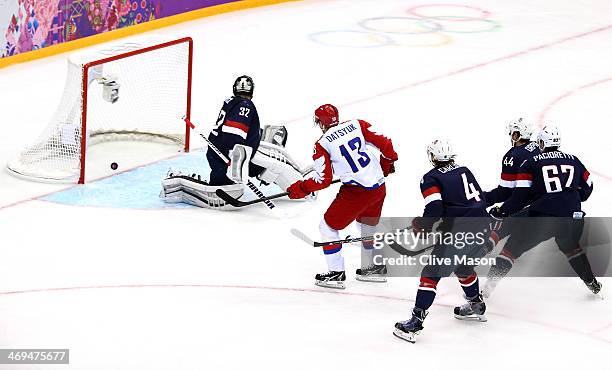 Pavel Datsyuk of Russia scores a goal against Jonathan Quick of the United States during the Men's Ice Hockey Preliminary Round Group A game on day...