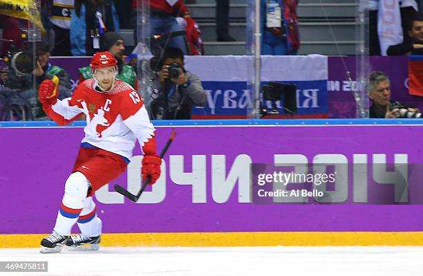 Pavel Datsyuk of Russia celebrates after scoring a second-period goal against the United States during the Men's Ice Hockey Preliminary Round Group A...