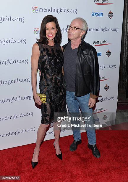 Supermodel Janice Dickinson and Dr. Robert Gerner attend the Mending Kids International's "Rock & Roll All-Stars" Fundraising Event on February 14,...