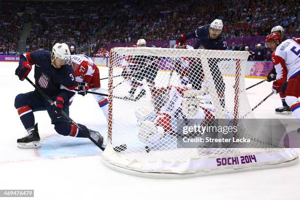 Cam Fowler of the United States scores a goal against Sergei Bobrovski of Russia during the Men's Ice Hockey Preliminary Round Group A game on day...