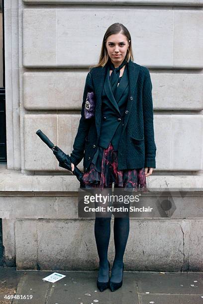 Model and DJ Amber Le Bon wears a Michael Kors bags and everything else Felder Felder on day 1 of London Collections: Women on February 14, 2014 in...