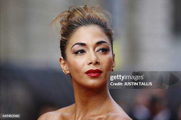 British singer and actress Nicole Scherzinger arrives on the red carpet for the Lawrence Olivier Awards for theatre at the Royal Opera House in...
