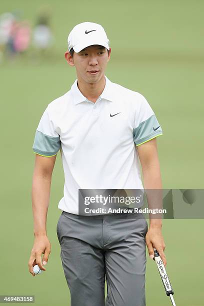 Seung-Yul Noh of Korea waits on the second hole during the final round of the 2015 Masters Tournament at Augusta National Golf Club on April 12, 2015...