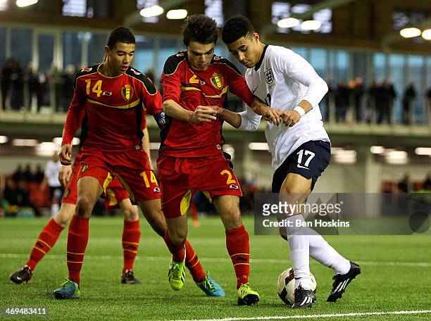 Andre Green of England holds off the challenge of Dries Caignau of Belgium during a U16 International match between England and Belgium at St Georges...