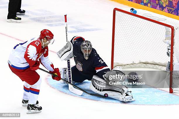Jonathan Quick of the United States makes a save on a shootout against Pavel Datsyuk of Russia during the Men's Ice Hockey Preliminary Round Group A...