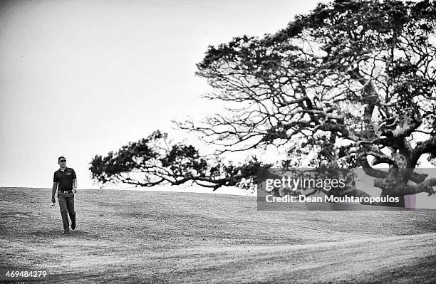 Lee Slattery of England walks on the 9th hole during Day 1 of the Africa Open at East London Golf Club on February 13, 2014 in East London, South...