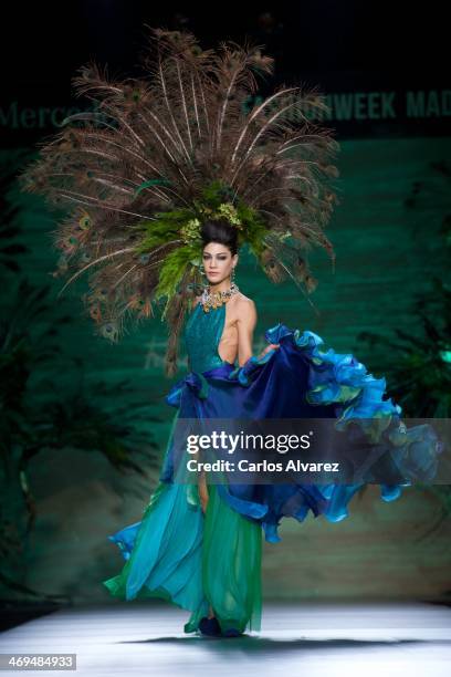 Model showcases designs by Francis Montesinos on the runway at Francis Montesinos show during Mercedes Benz Fashion Week Madrid Fall/Winter 2014 at...