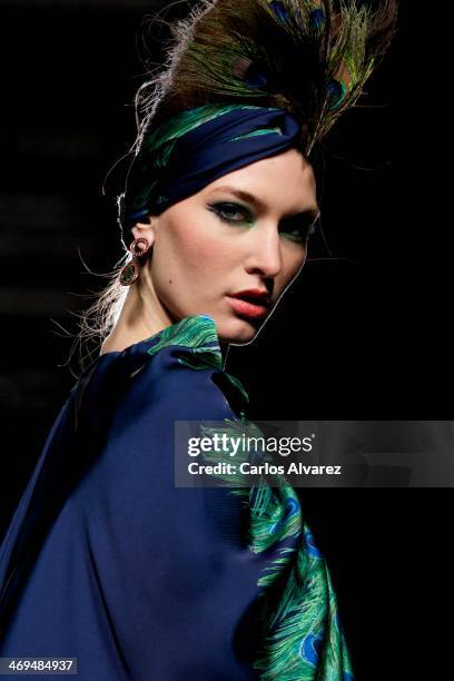 Model showcases designs by Francis Montesinos on the runway at Francis Montesinos show during Mercedes Benz Fashion Week Madrid Fall/Winter 2014 at...