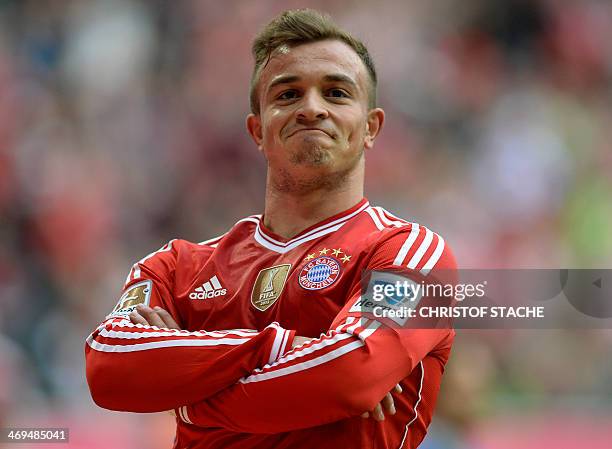 Bayern Munich's Swiss midfielder Xherdan Shaqiri celebrates during the German first division Bundesliga football match FC Bayern Munich vs Sport Club...