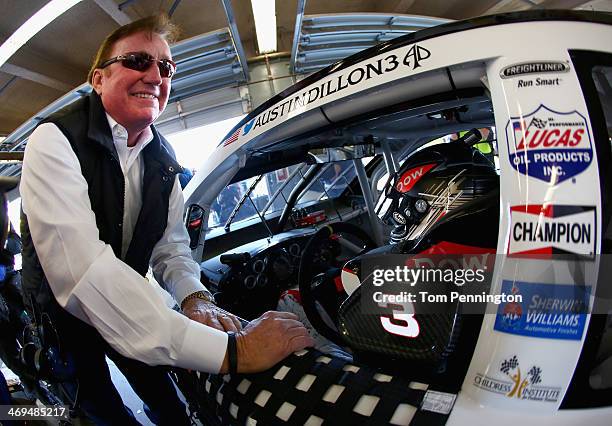 Team owner Richard Childress speaks with Austin Dillon, driver of the DOW Chevrolet, during practice for the NASCAR Sprint Cup Series Daytona 500 at...