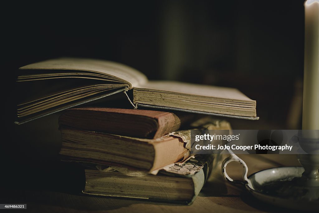 Vintage books by candlelight