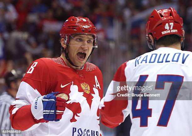 Alexander Ovechkin of Russia reacts with Alexander Radulov after a play in the third period against the United States during the Men's Ice Hockey...